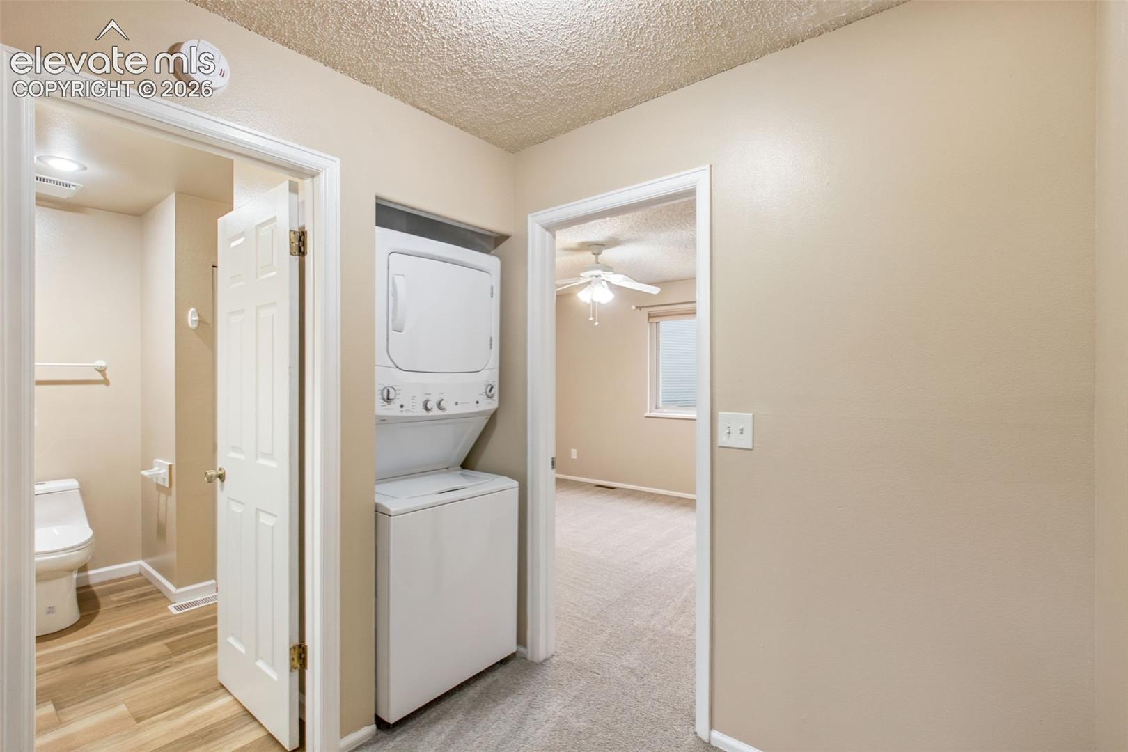 The washer and dryer, which are included in the purchase price of the home, are conveniently located by the bedrooms in order to ease laundry day!