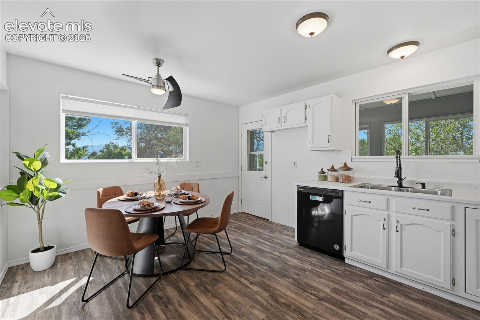Eat in kitchen with door to enclosed back porch. 