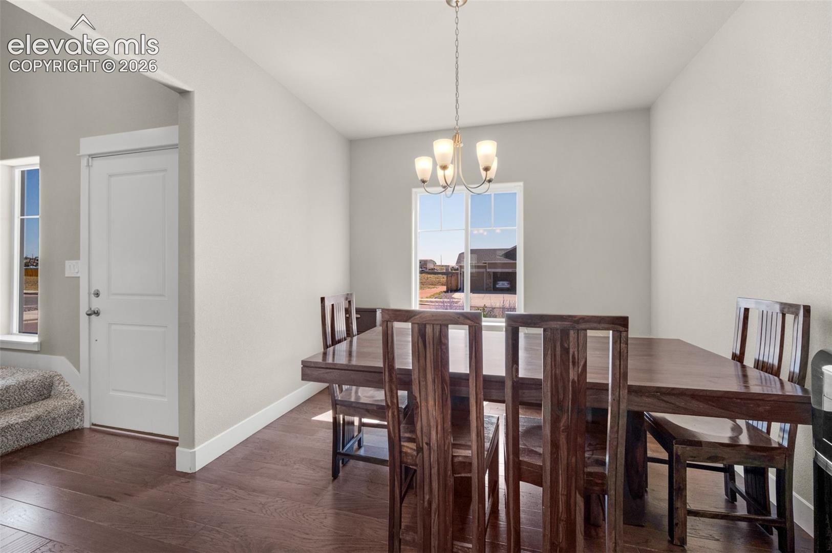 Formal dining area looks out to front yard