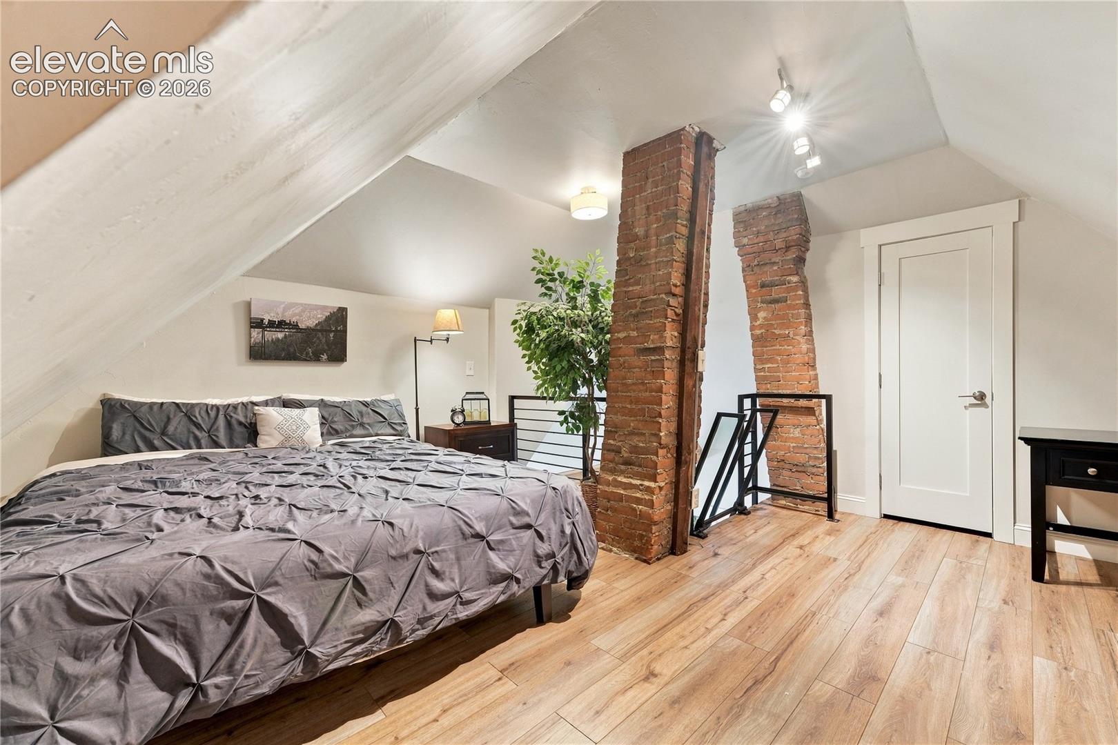 Opposite view of the Loft area. Nice size attic storage area behind the door. 