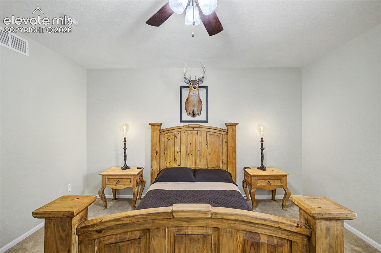 The intimate scale and warm tones of this bedroom create a restful environment — a space where the design details feel considered rather than accidental.