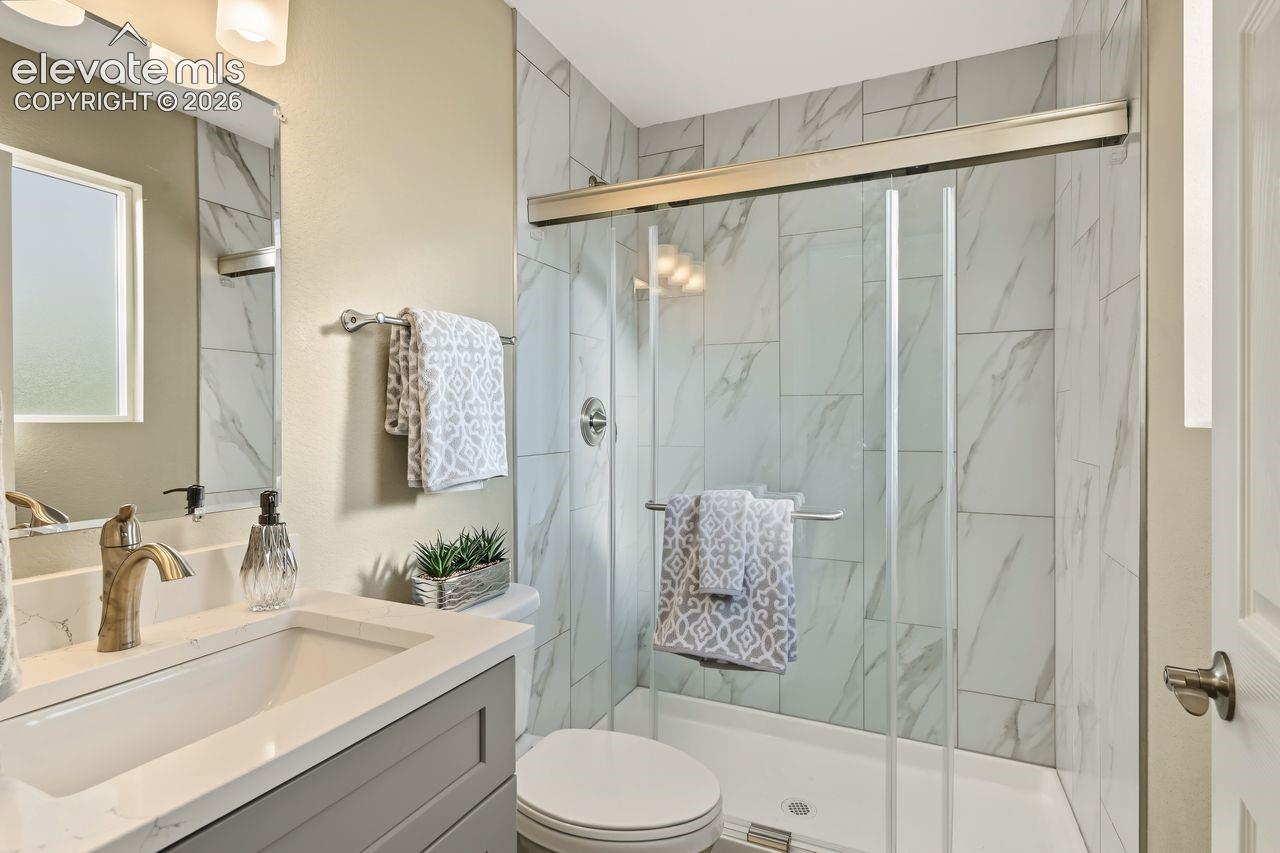 Main level new bathrom with glass doors!
