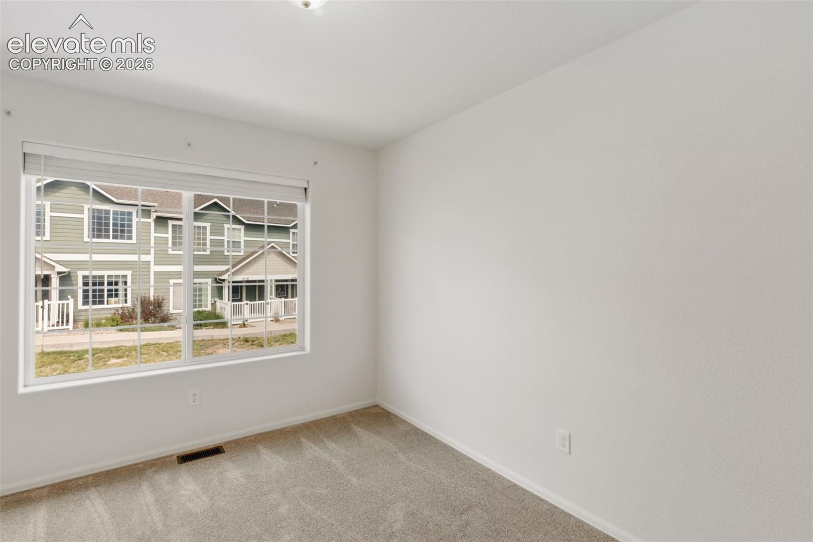 Transform this versatile space into the ultimate work-from-home office, a dedicated hobby room, or a nursery
