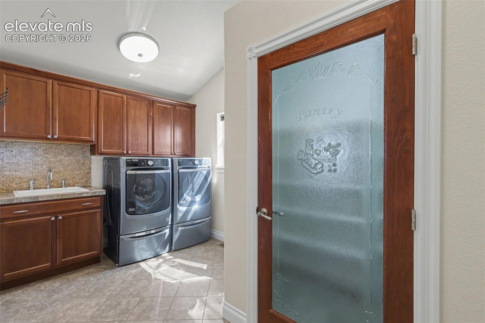 Large Walk-In Pantry, Laundry Area & Utility Sink