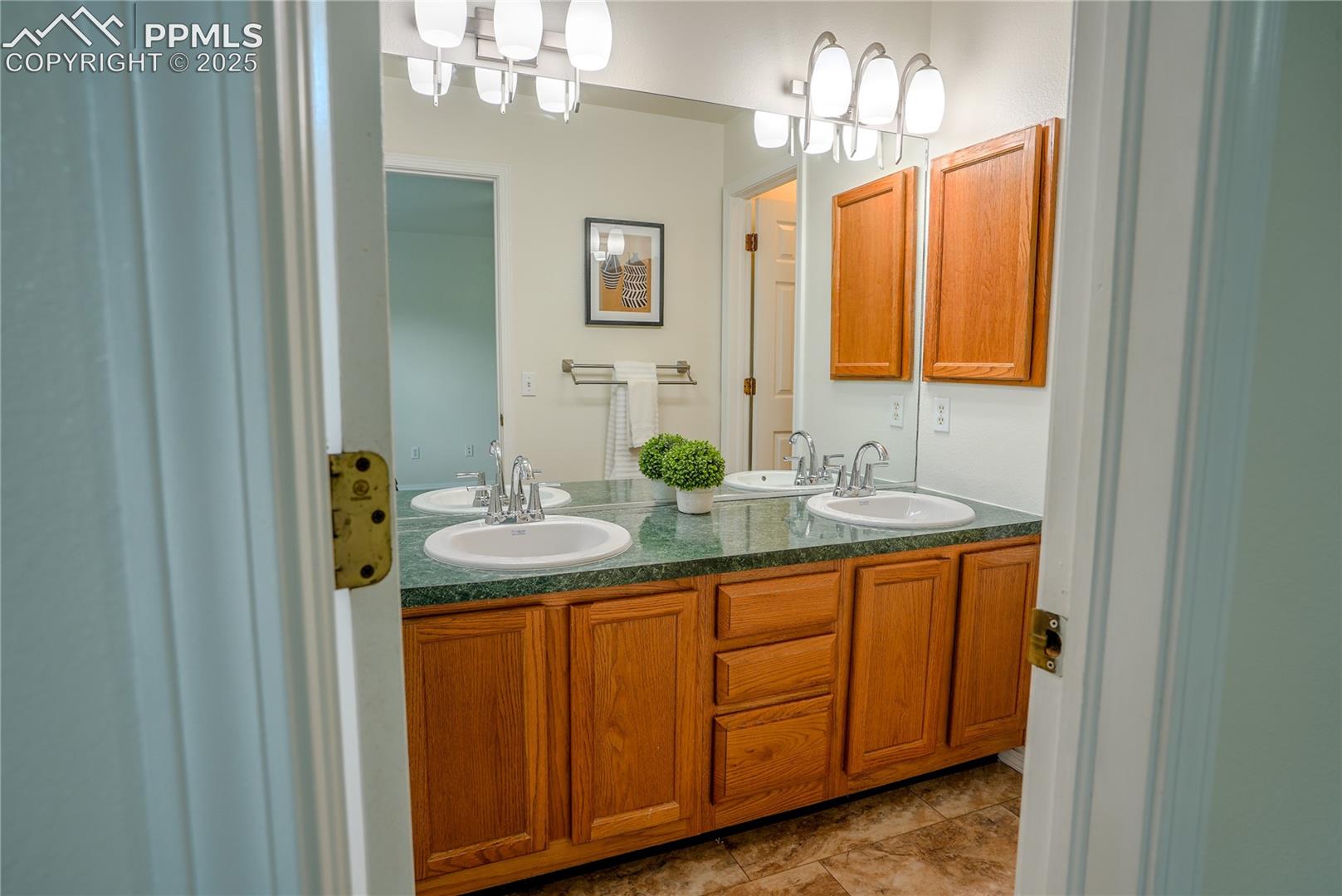 Full bathroom with double vanity