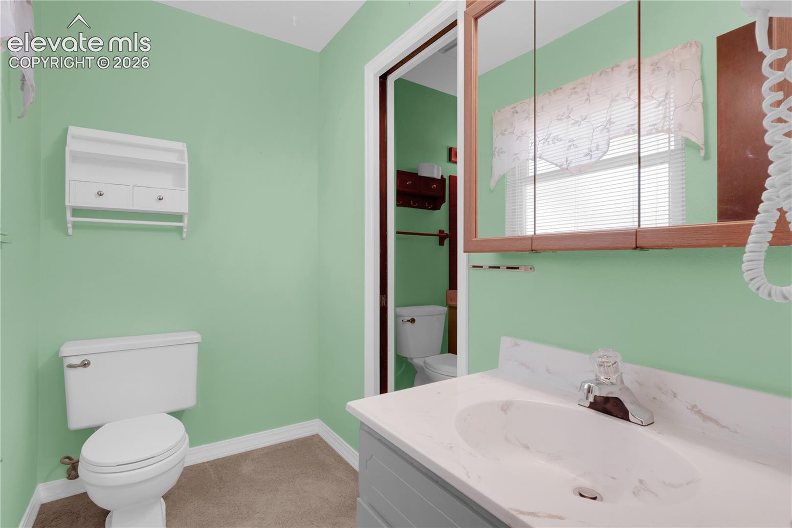 Half bath next to upper level full bath