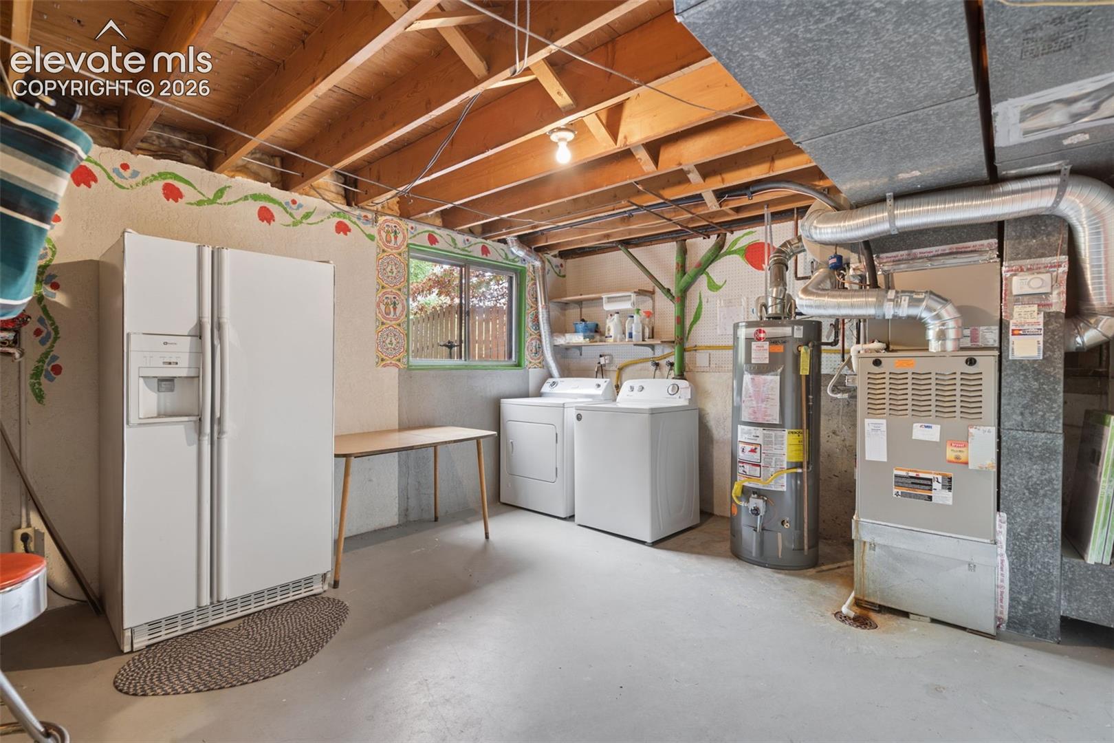 Unfinished basement provides additional storage space. Built in shelves are not shown in photo. 