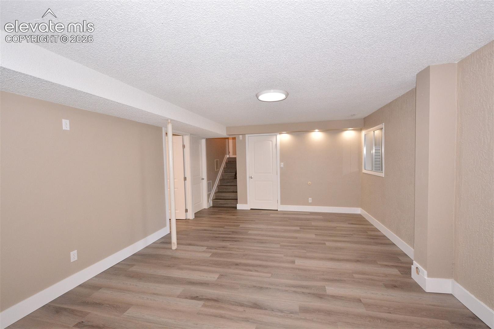 Large room that can be used as a rec room, office, etc in the basement