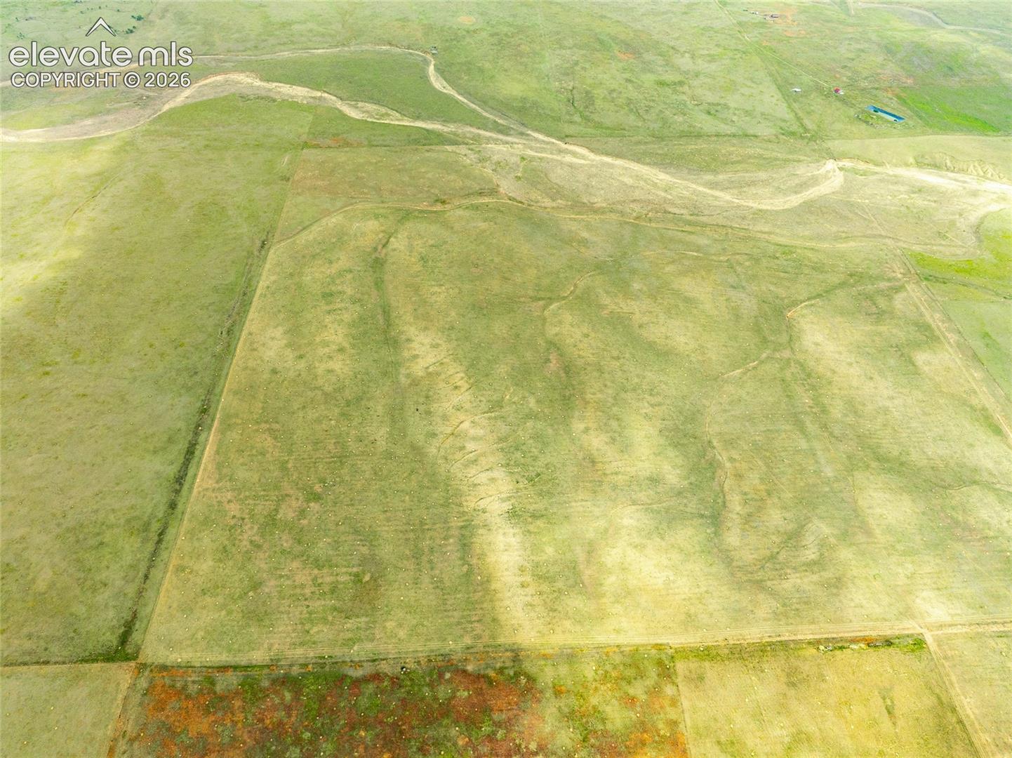 Expansive acreage featuring rolling terrain and natural topography