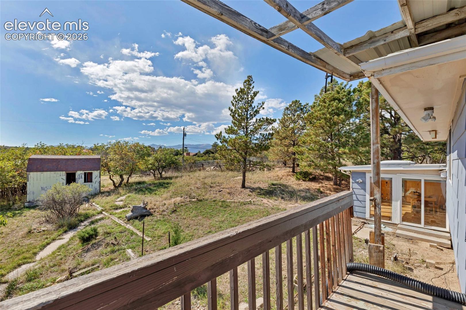 Wood deck with slatted railing