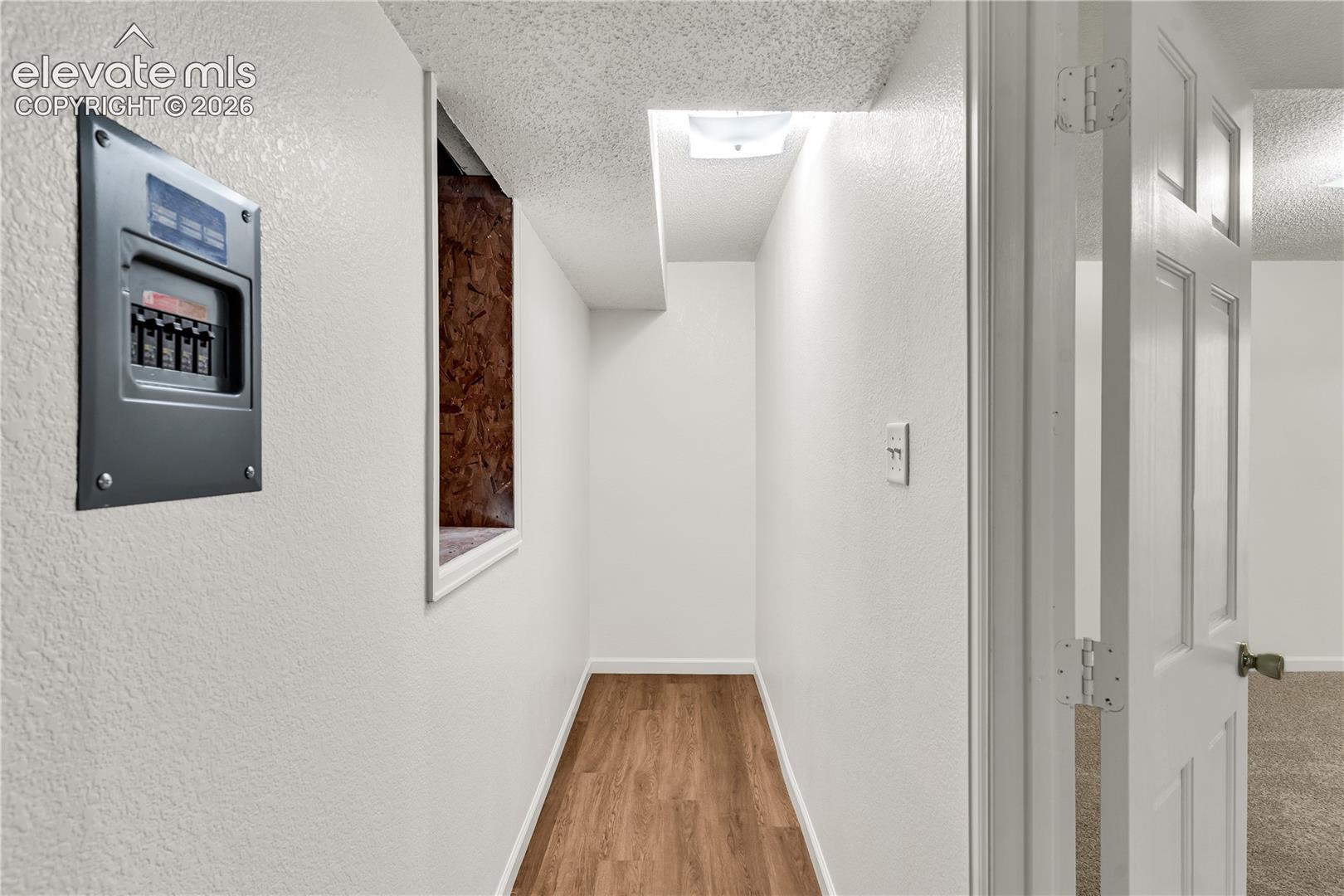 Basement storage to crawl space access