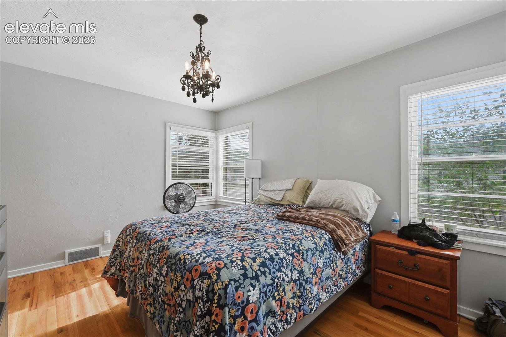 Hardwood flooring complemented by light-toned walls