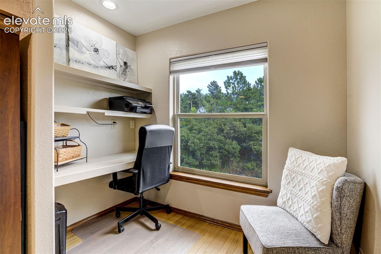 Desk area in secondary bedroom on upper level
