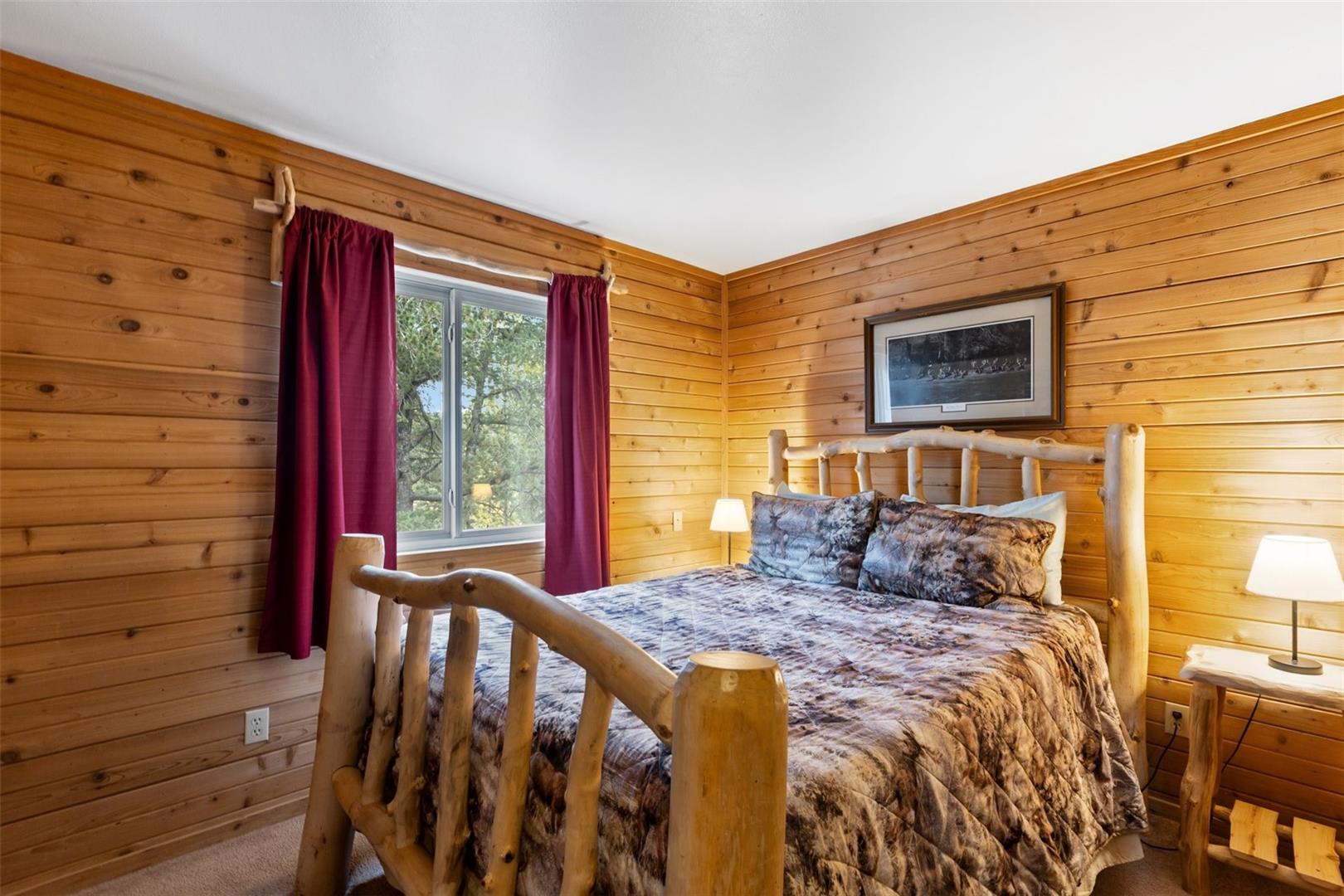 Wood-paneled walls with a light wood finish