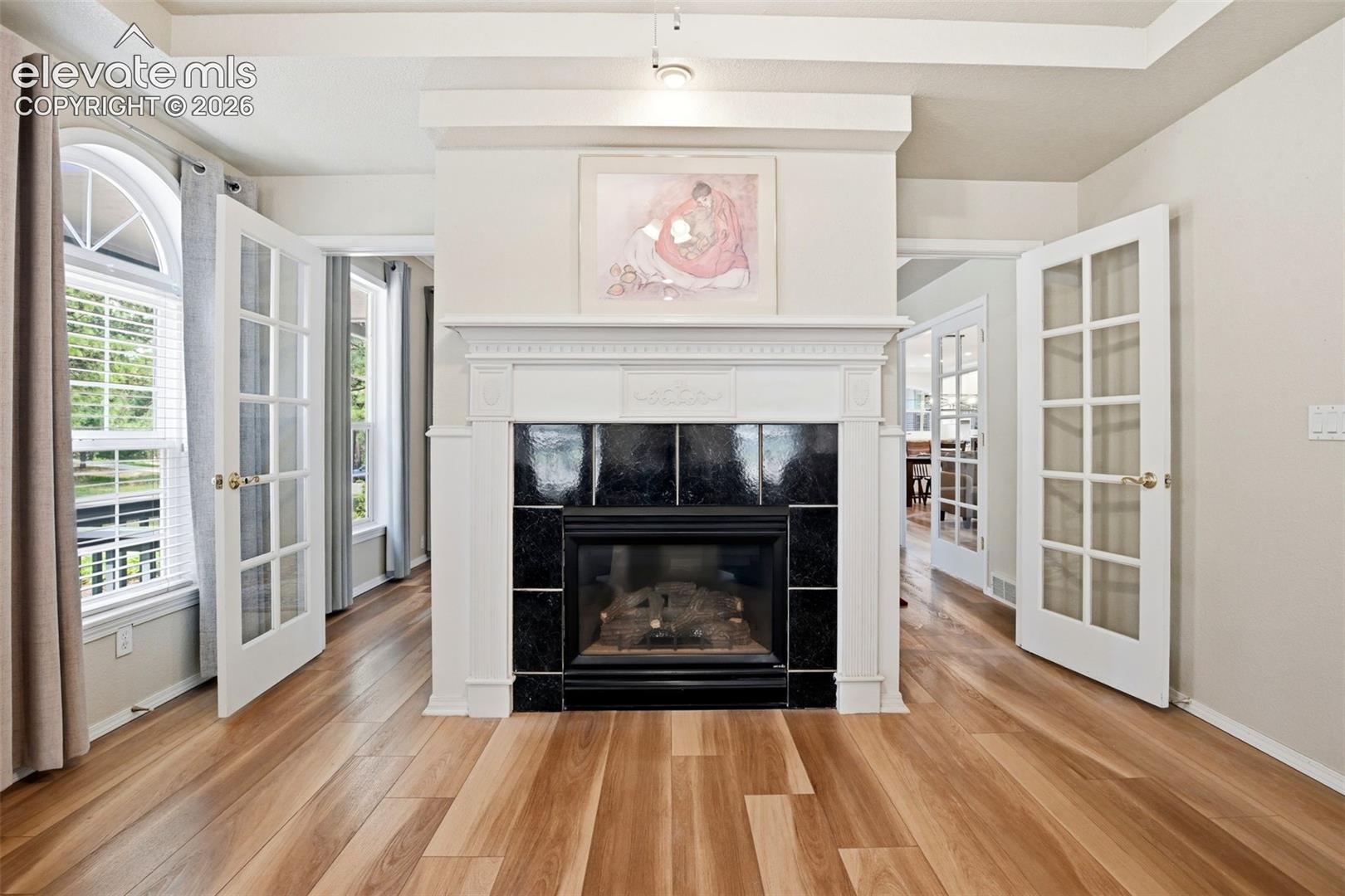 Living room addition on the Main level - with gas log fireplace that leads to the sunroom.