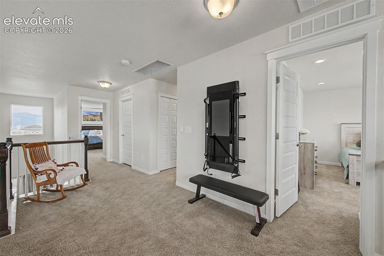 View of upper level hallway from loft.