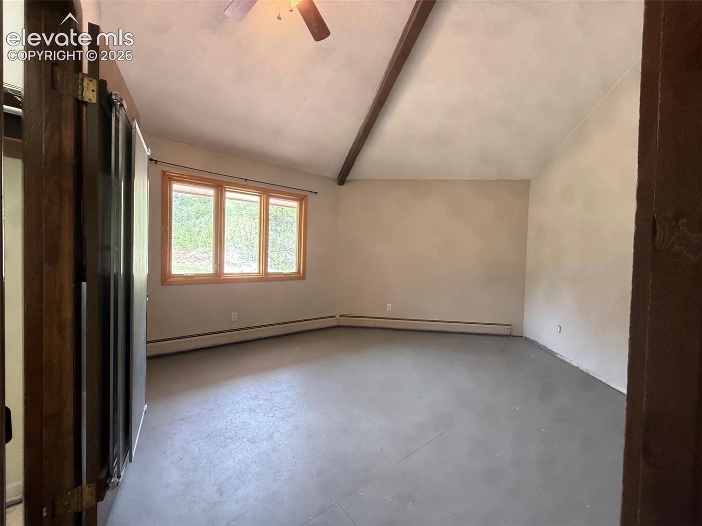 Master bedroom with walk-in closet and attached bath