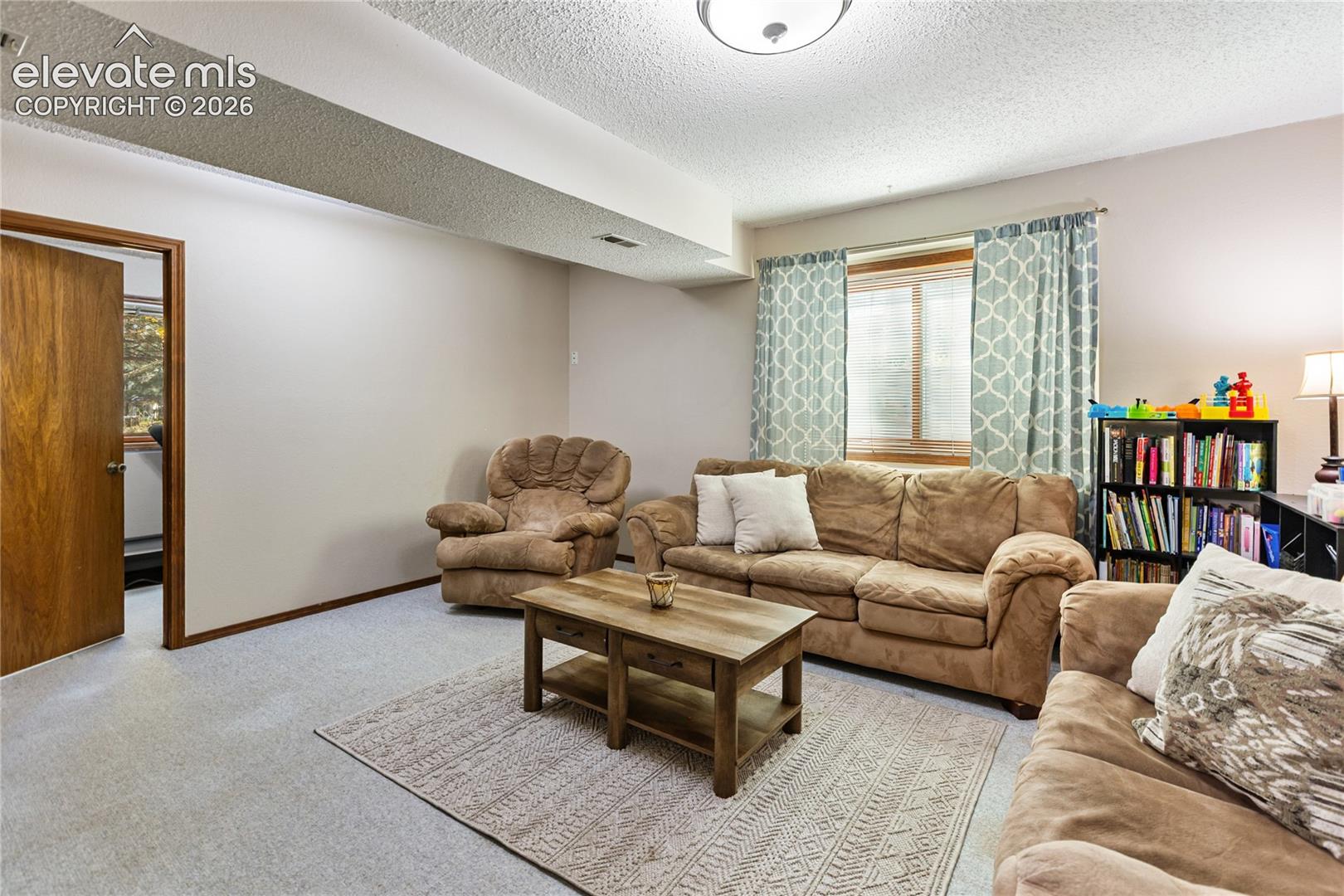 On the lower level, there is a spacious family room