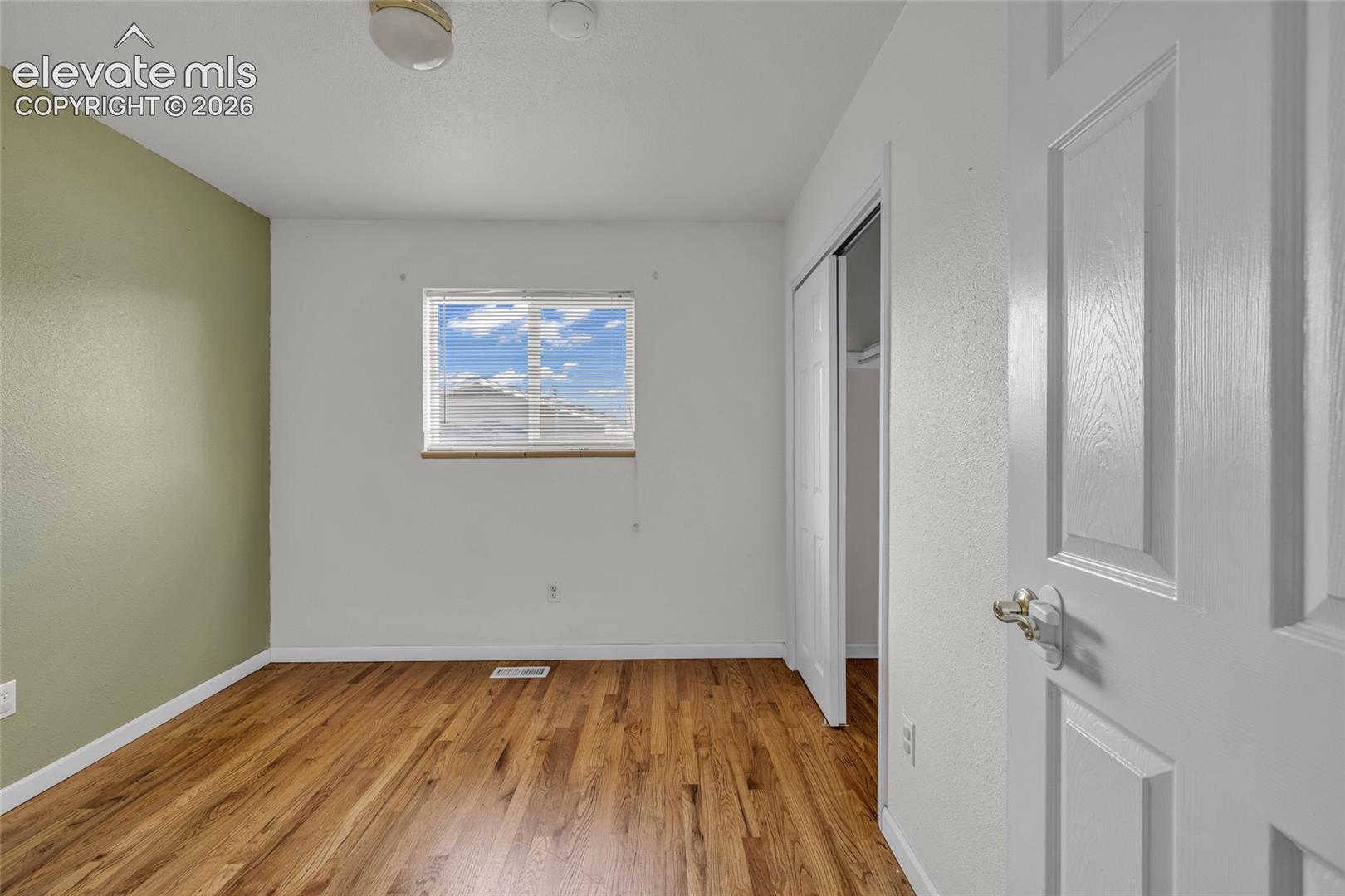 Hardwood-style flooring throughout