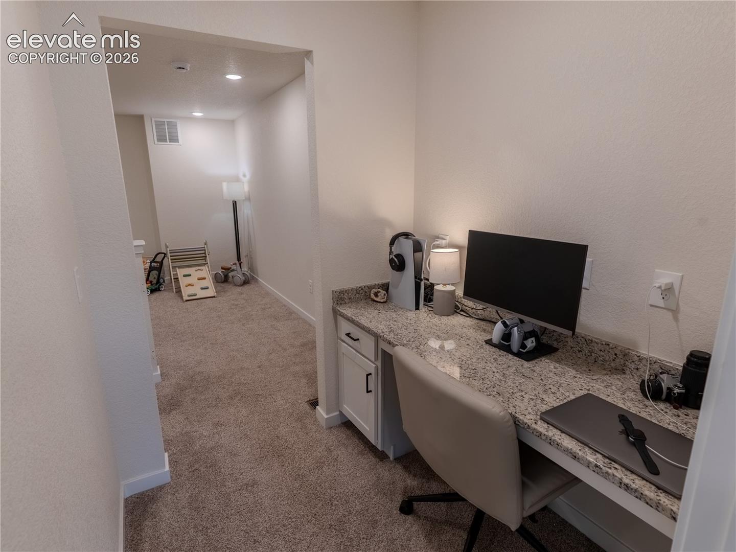 leaving Primary Bedroom and walking through desk area to loft area 