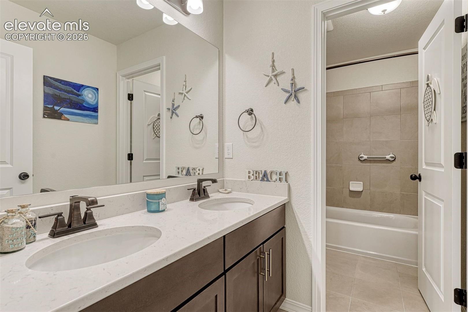 Dual vanity and separate tub/shower room