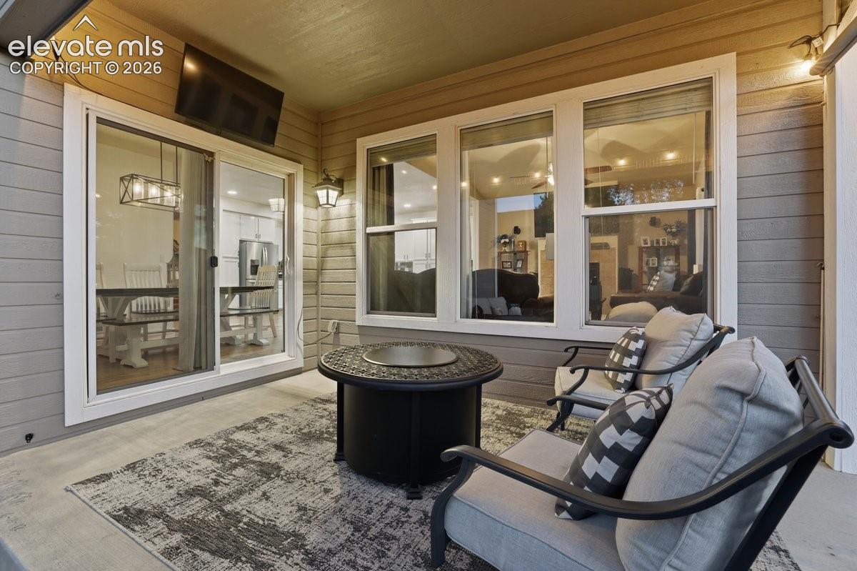 cozy patio space with the option to watch TV