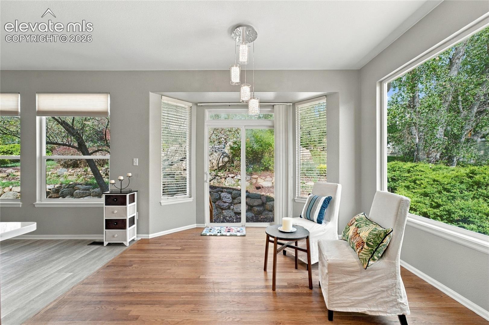 kitchen nook with bright light and access to back yard