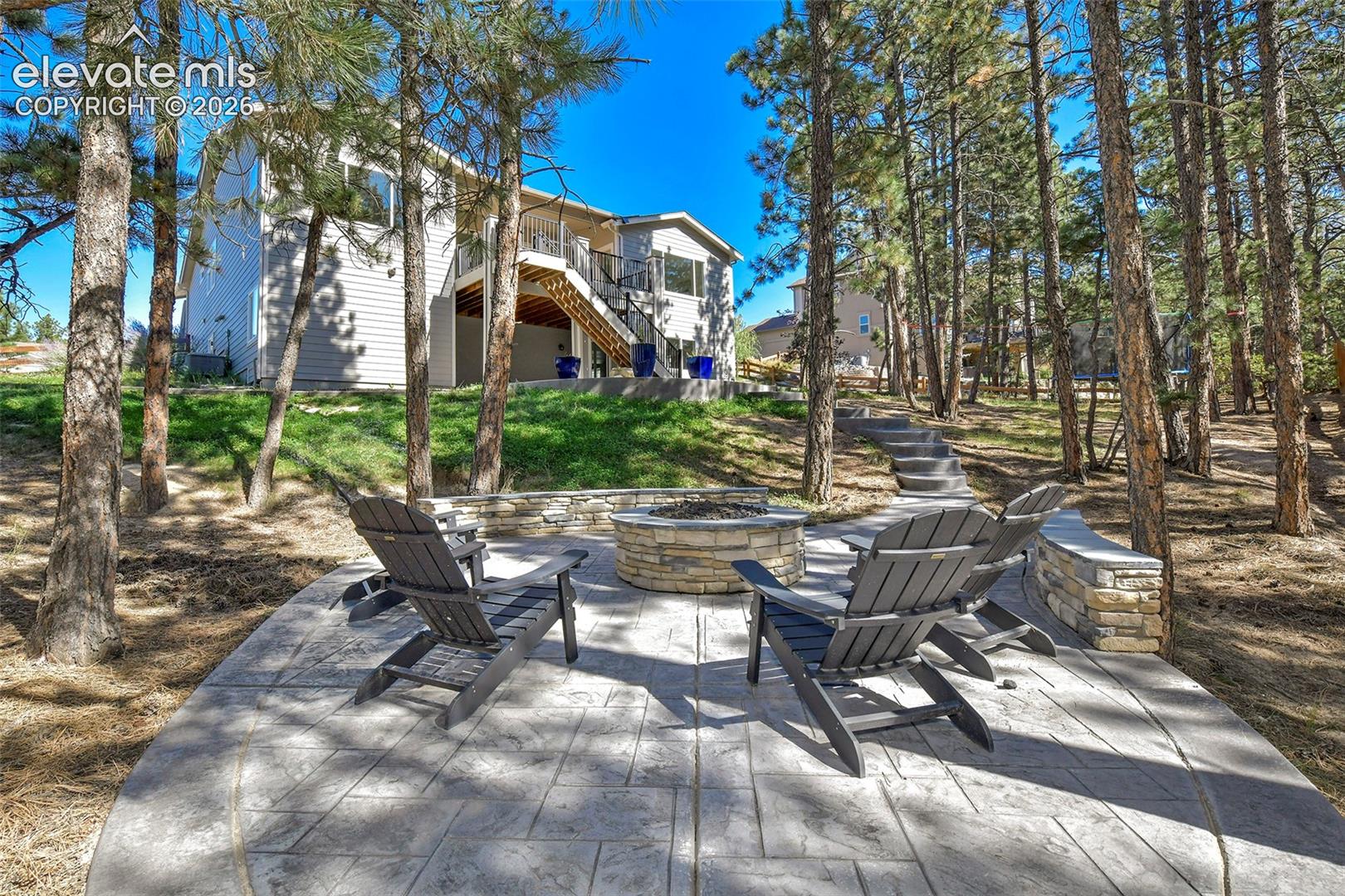 Stamped concrete steps lead back to the home!
