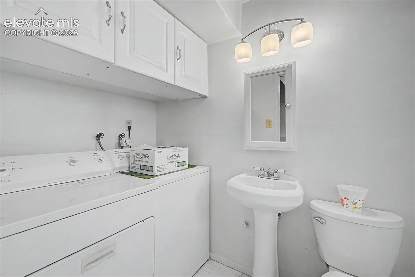Lower Bathroom with Laundry Room