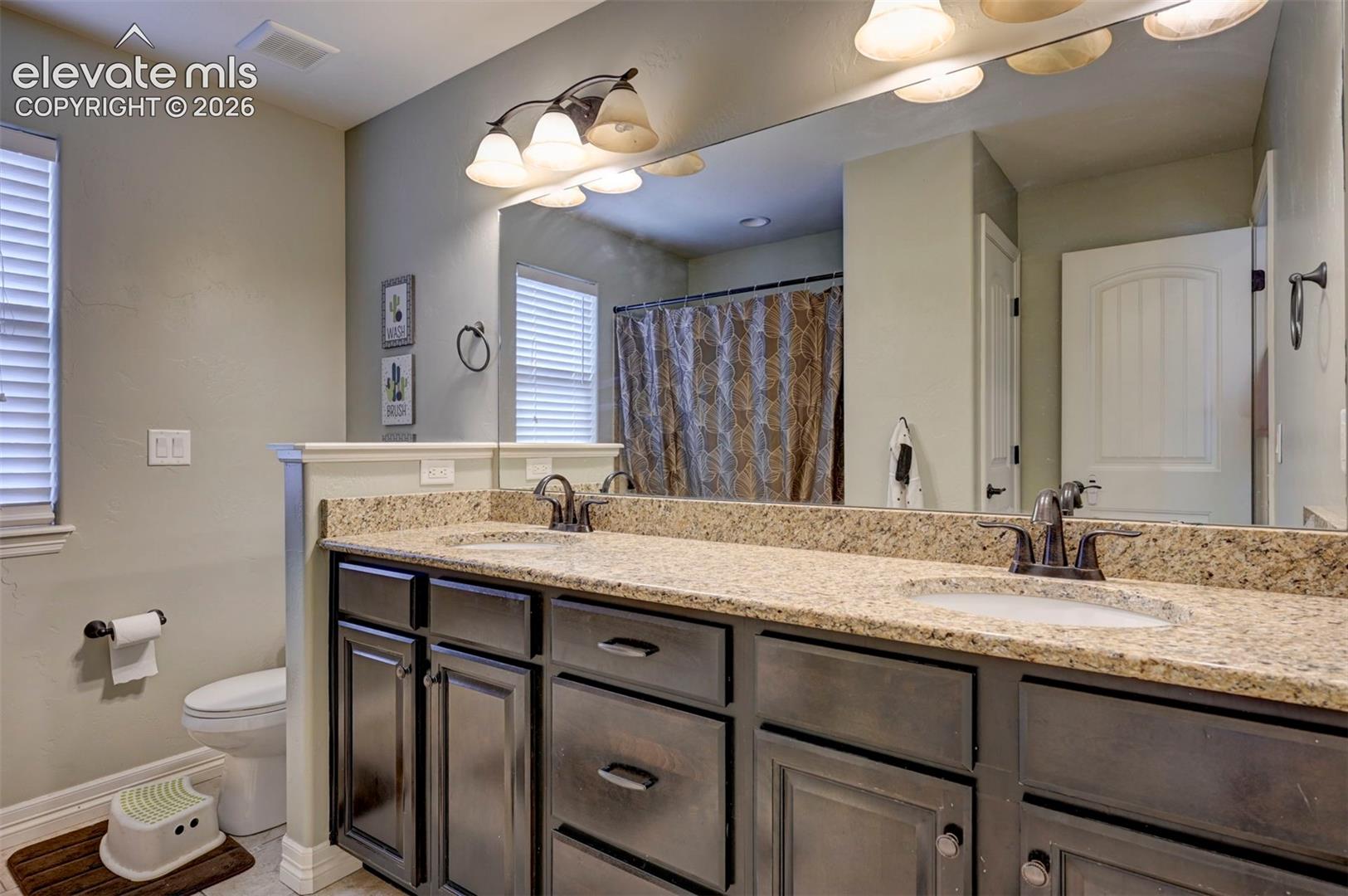 Upstairs hall bath with double vanity