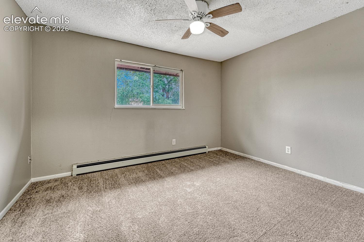 Neutral-toned carpeting throughout