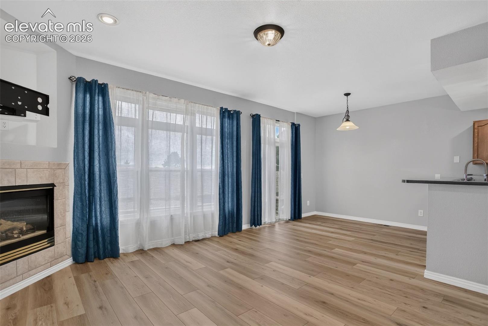 Living space has access to back patio and plenty of natural light