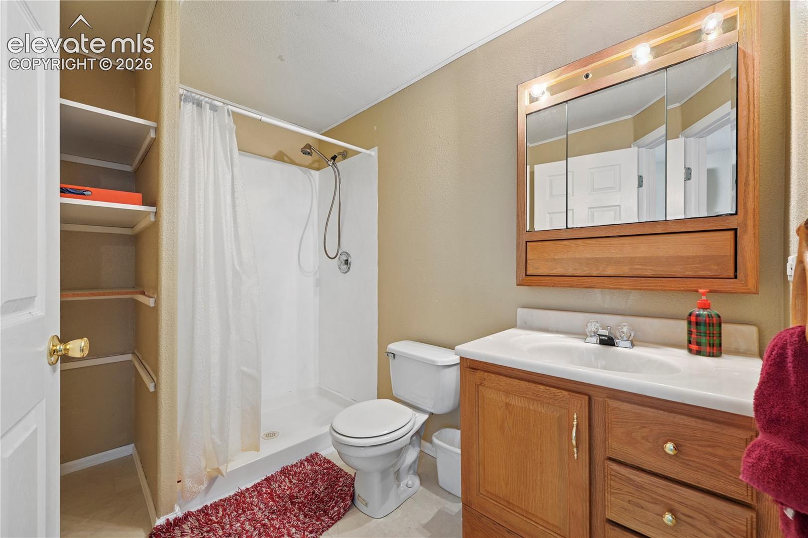 Private 3/4 bathroom for the basement family room/ guest room/ play space.