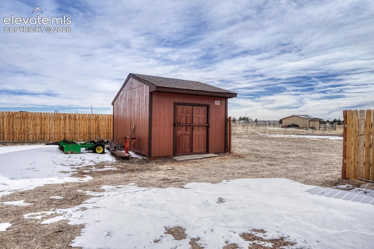 second storage shed, gate from fence.