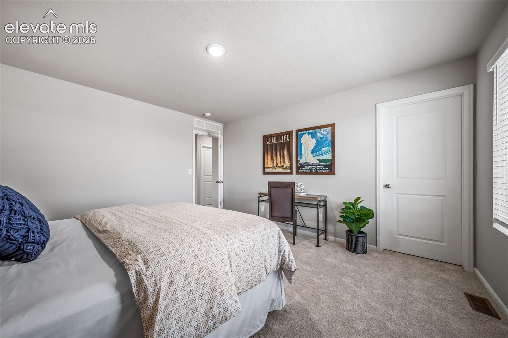 Recessed ceiling lighting, light gray wall paint, white trim, paneled interior doors, and gray 
*photos of a model home*carpeted flooring