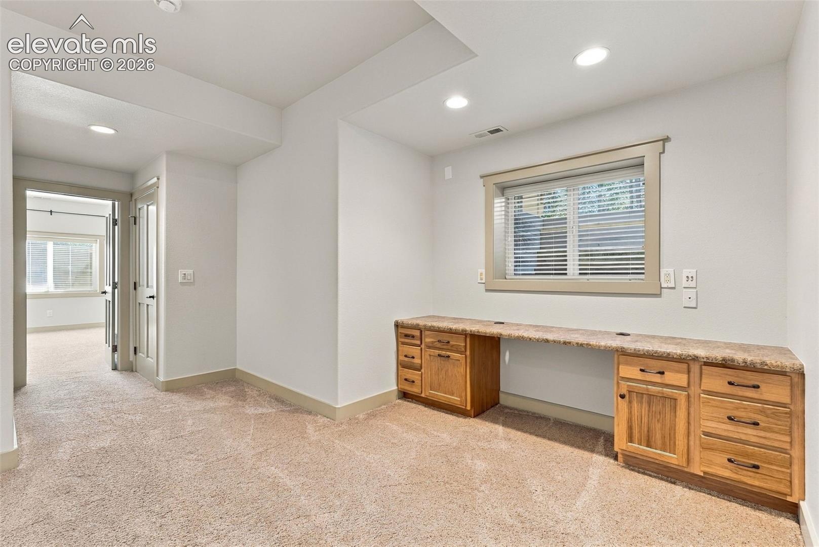 2nd office, lower level, for crafts or homework station