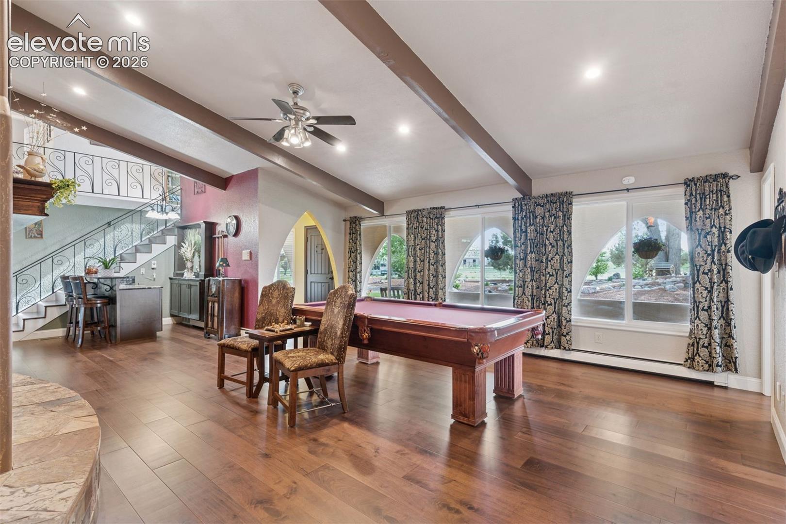 Alternate view of Family room with covered front porch through windows