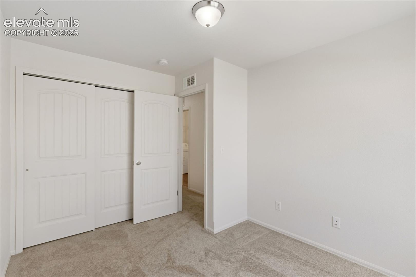 Fresh carpeting and neutral tones provide the perfect foundation for your unique interior design style