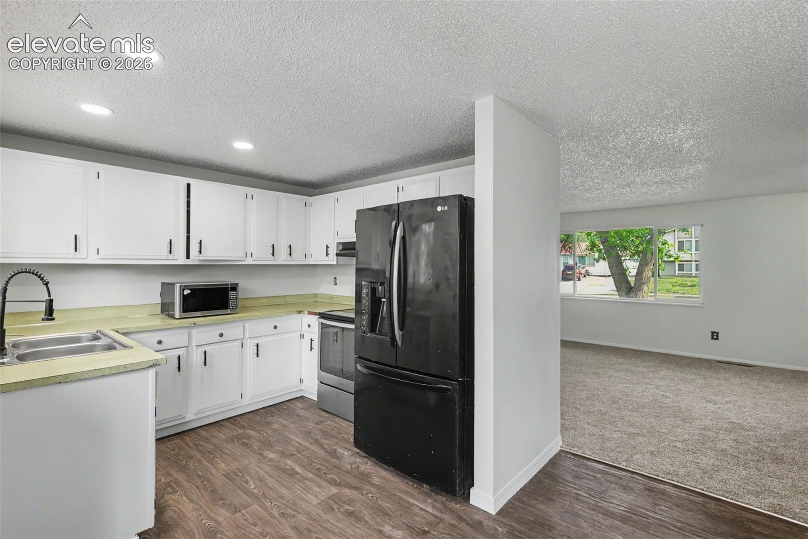 Clean and functional kitchen with room to make it your own over time.
