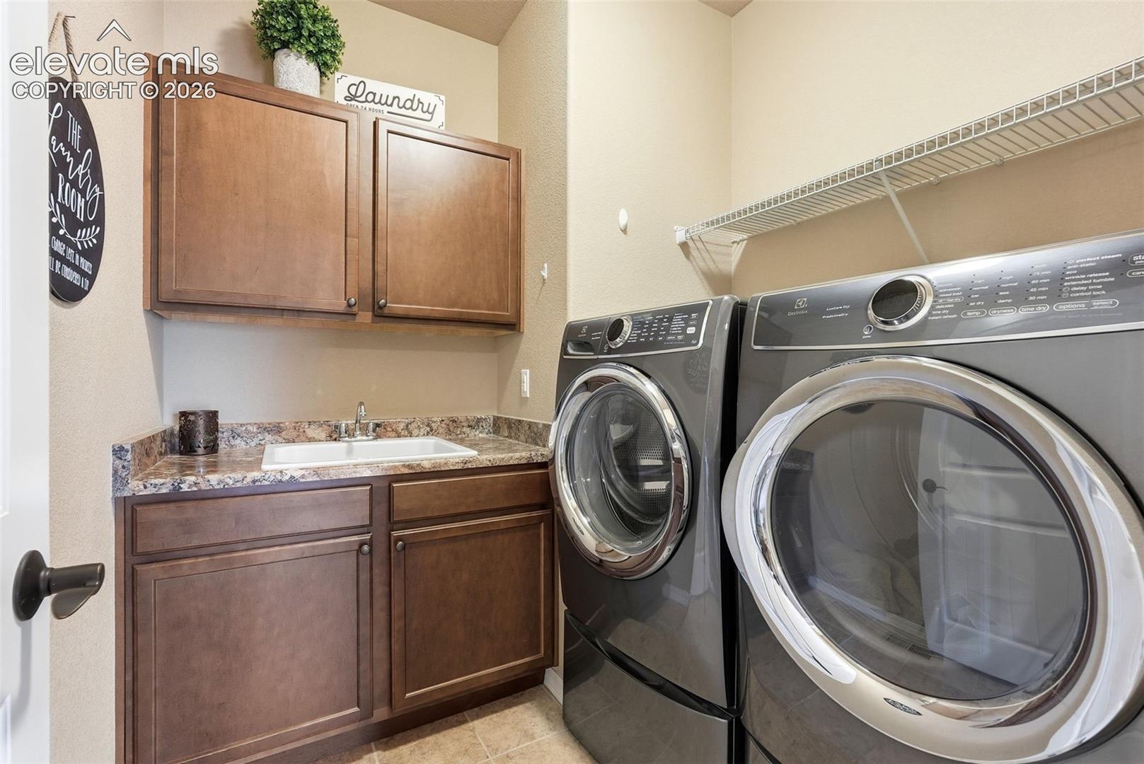 Upper laundry room. Washer and dryer included!