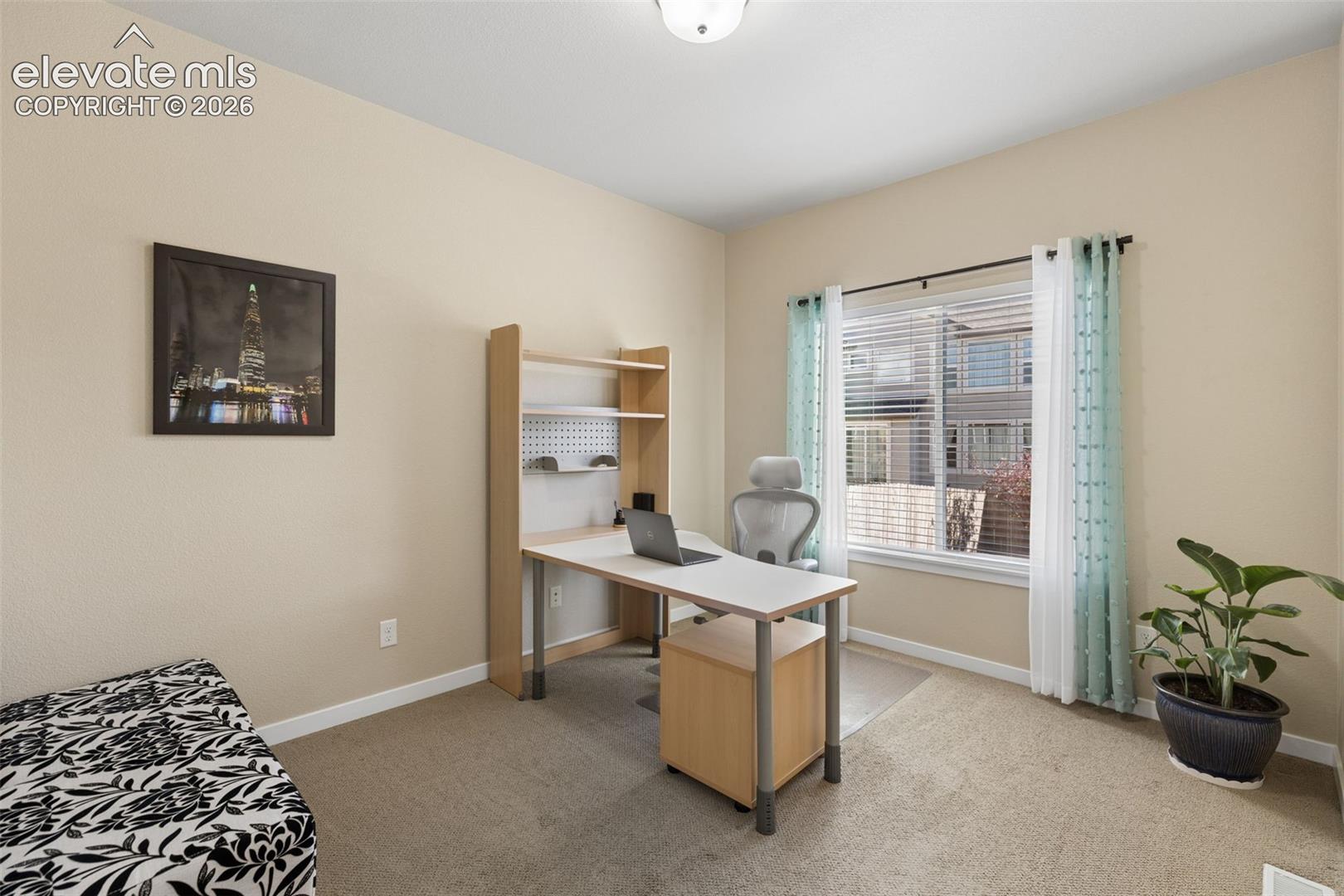 Main level office is right next to a full bath; could be used as a bedroom