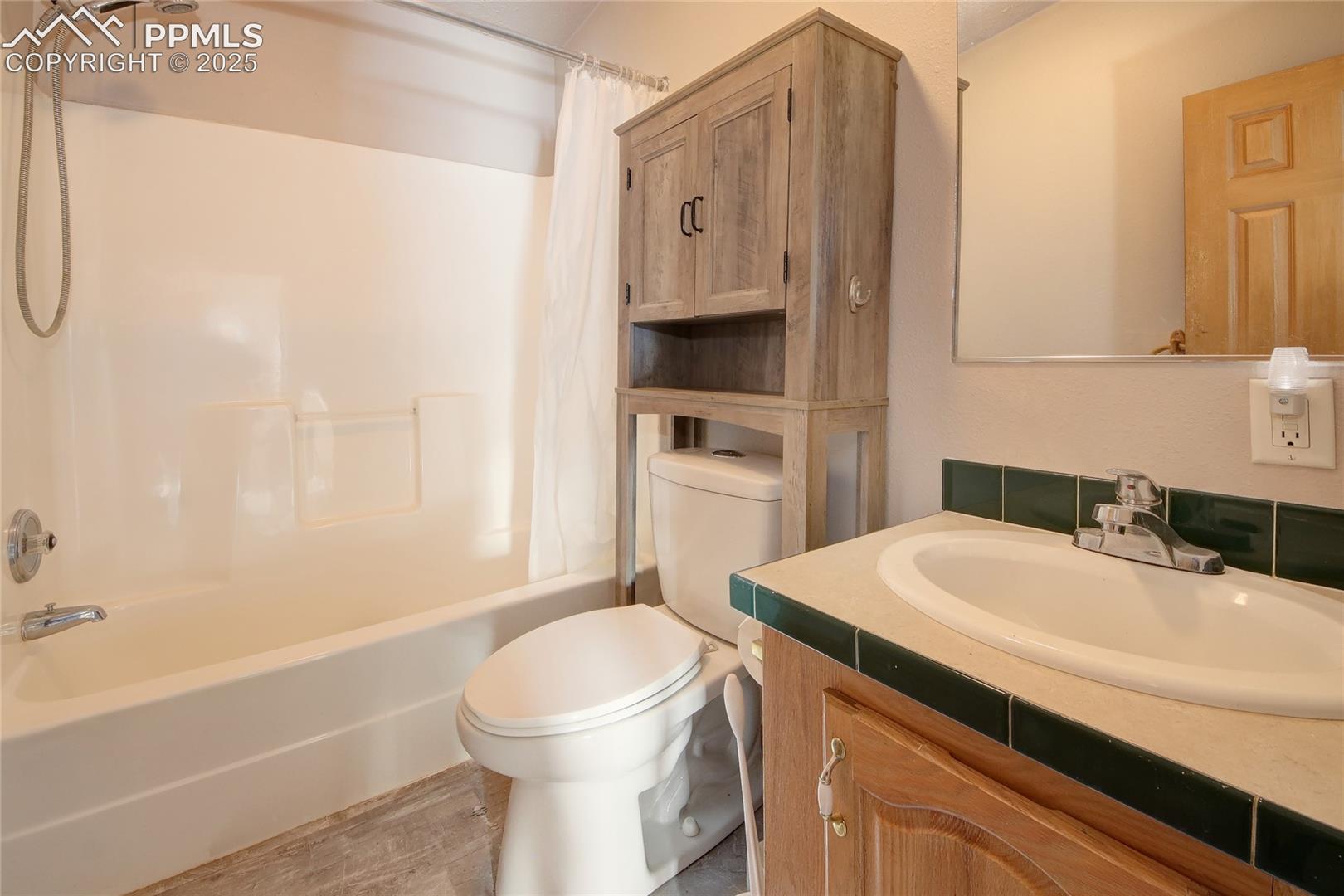 Full hallway bathroom on main level.