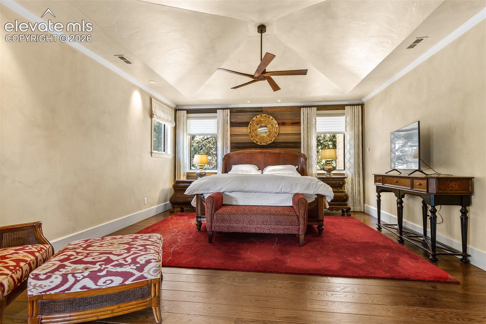 2nd floor primary bedroom, vaulted ceilings.