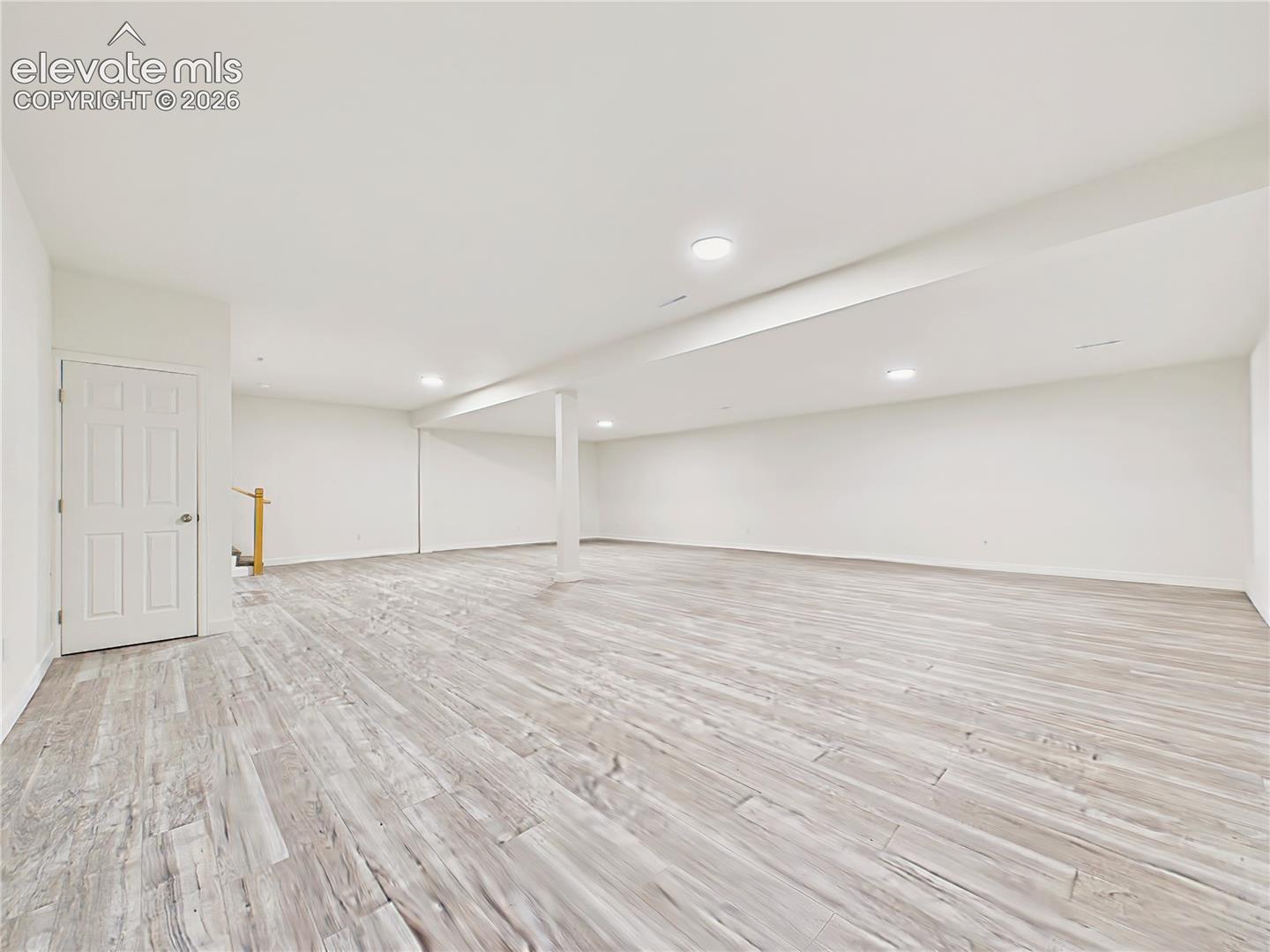 Finished Basement – Generous open basement offers substantial flexible living space with 9-foot ceilings, recessed lighting, and wood-look flooring—ready for a variety of entertainment and recreation uses.