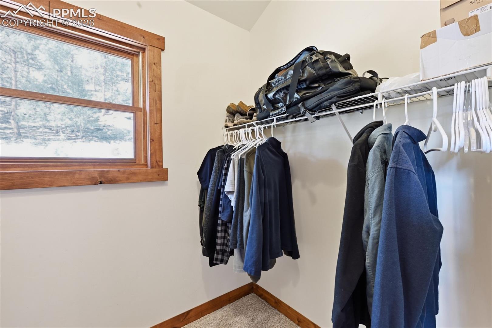 First walk-in closet for the primary retreat. 