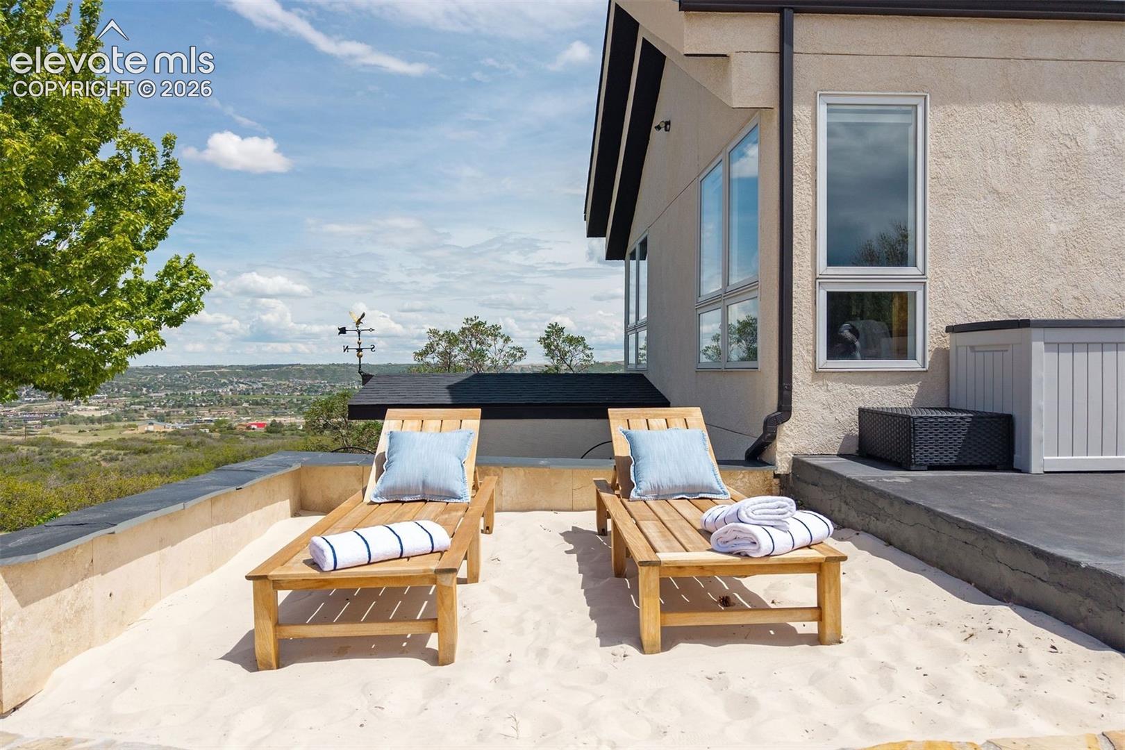 Enjoy your own private white sand beach seating area.