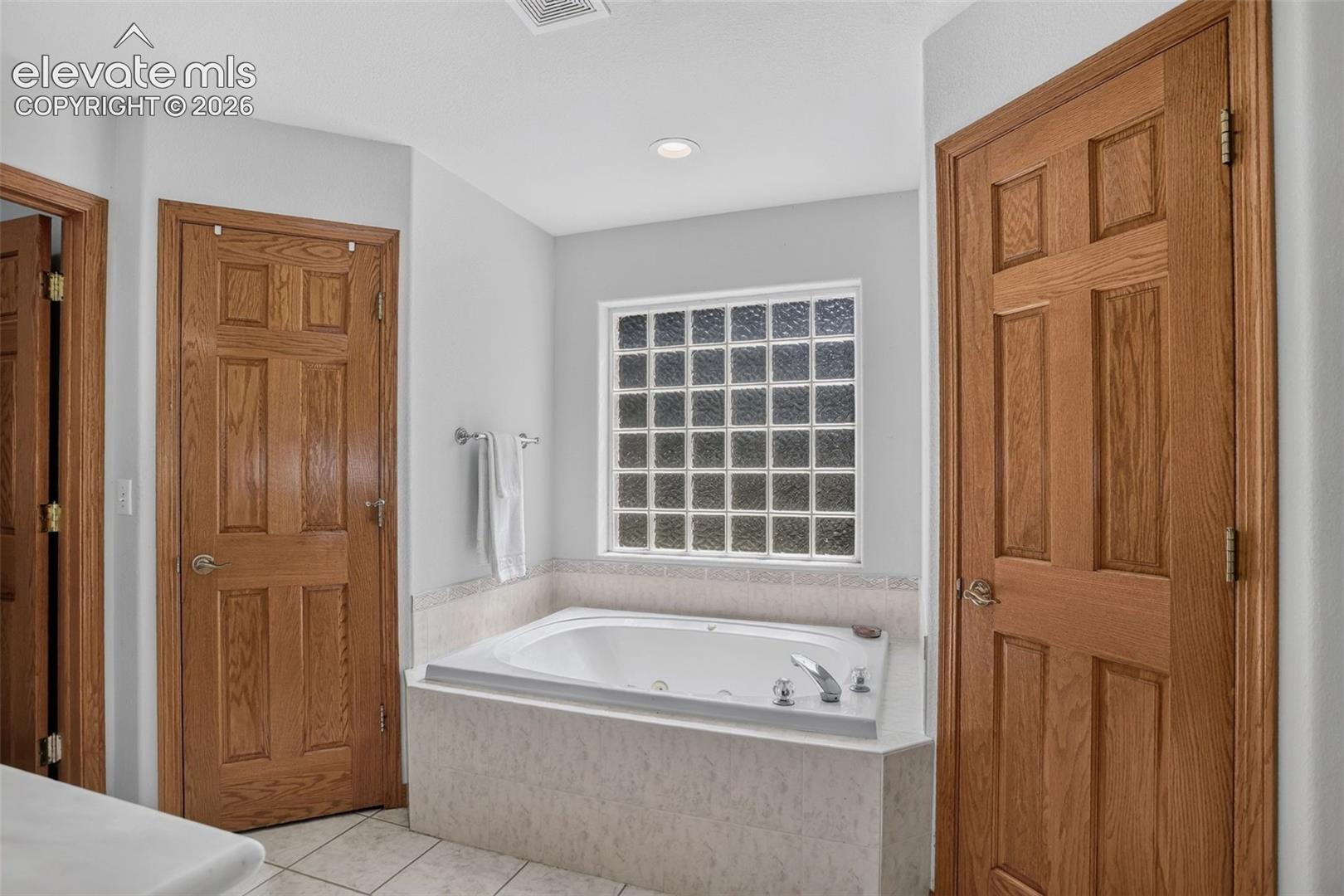 Primary bathroom with jetted tub.