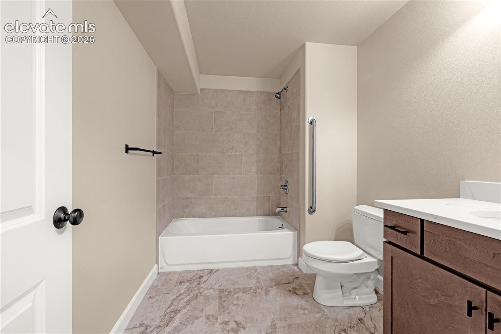 Lower level full bathroom has new tile flooring, new vanity, new toilet, net tub/shower.  Perfect for guests and family members.  