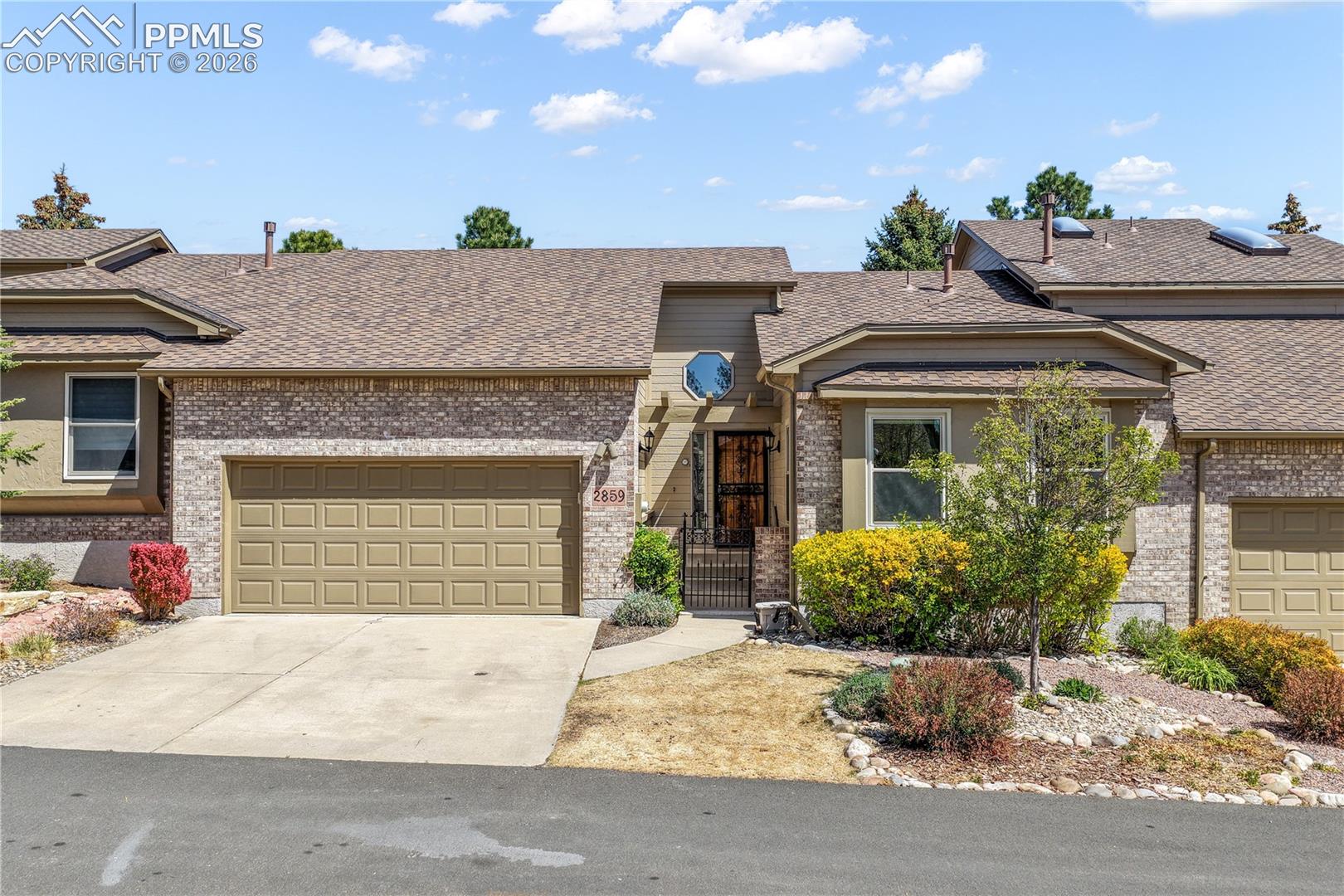 Front of home with 2 car garage