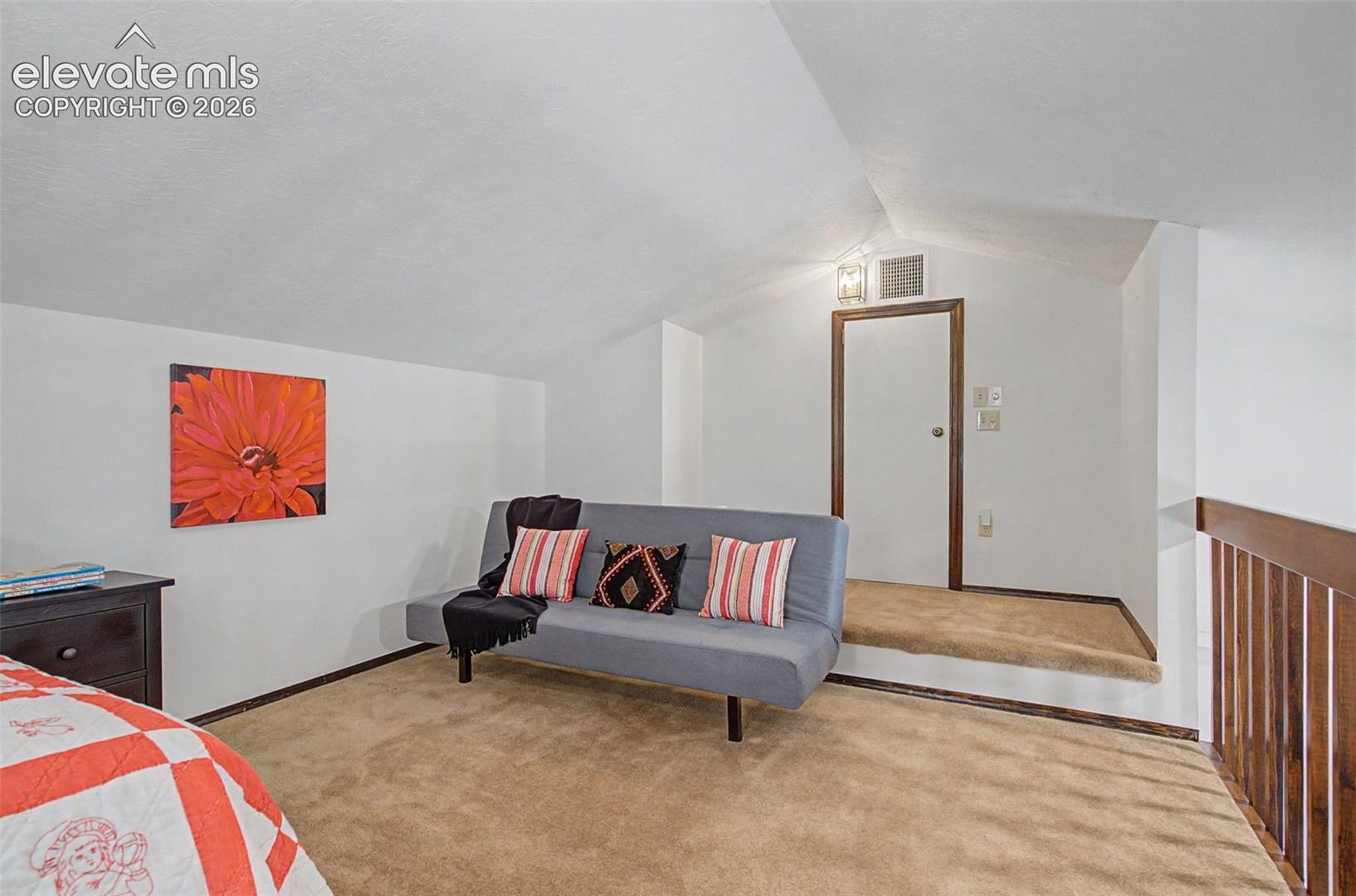 Another view of the loft! Plenty of room for an extra bed or maybe a library and a reading nook. 